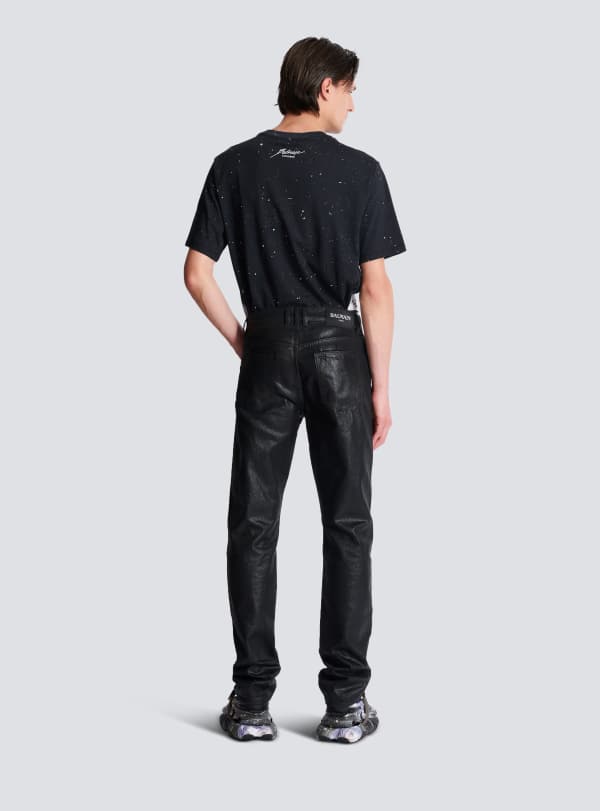 Balmain Paris Jean Regular En Denim Enduit Noir - Homme