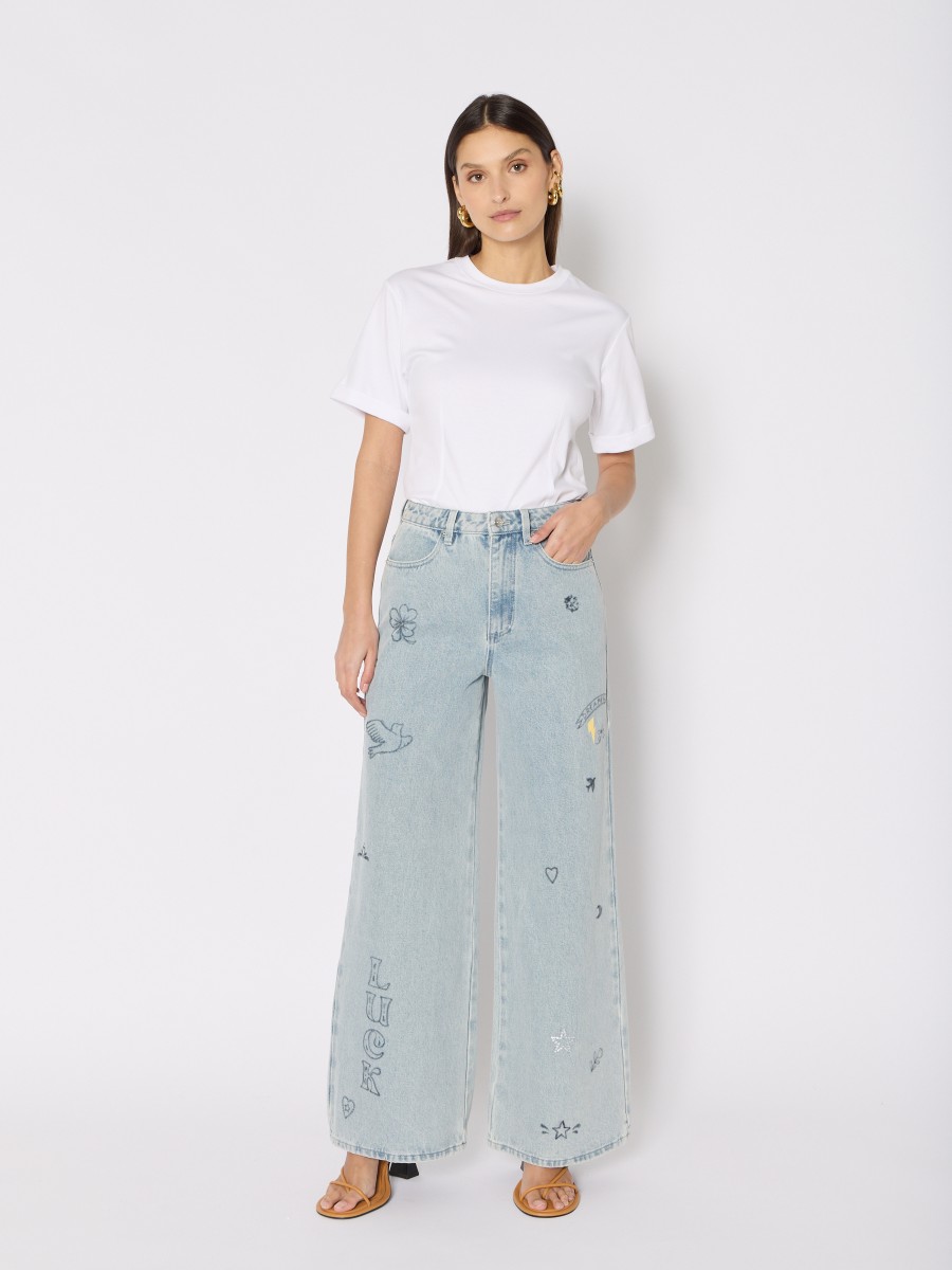 Berenice Jean Bleu MEMPHISLUCKY – Coupe Wide Leg 100% Coton Patchs Imprimés Strass