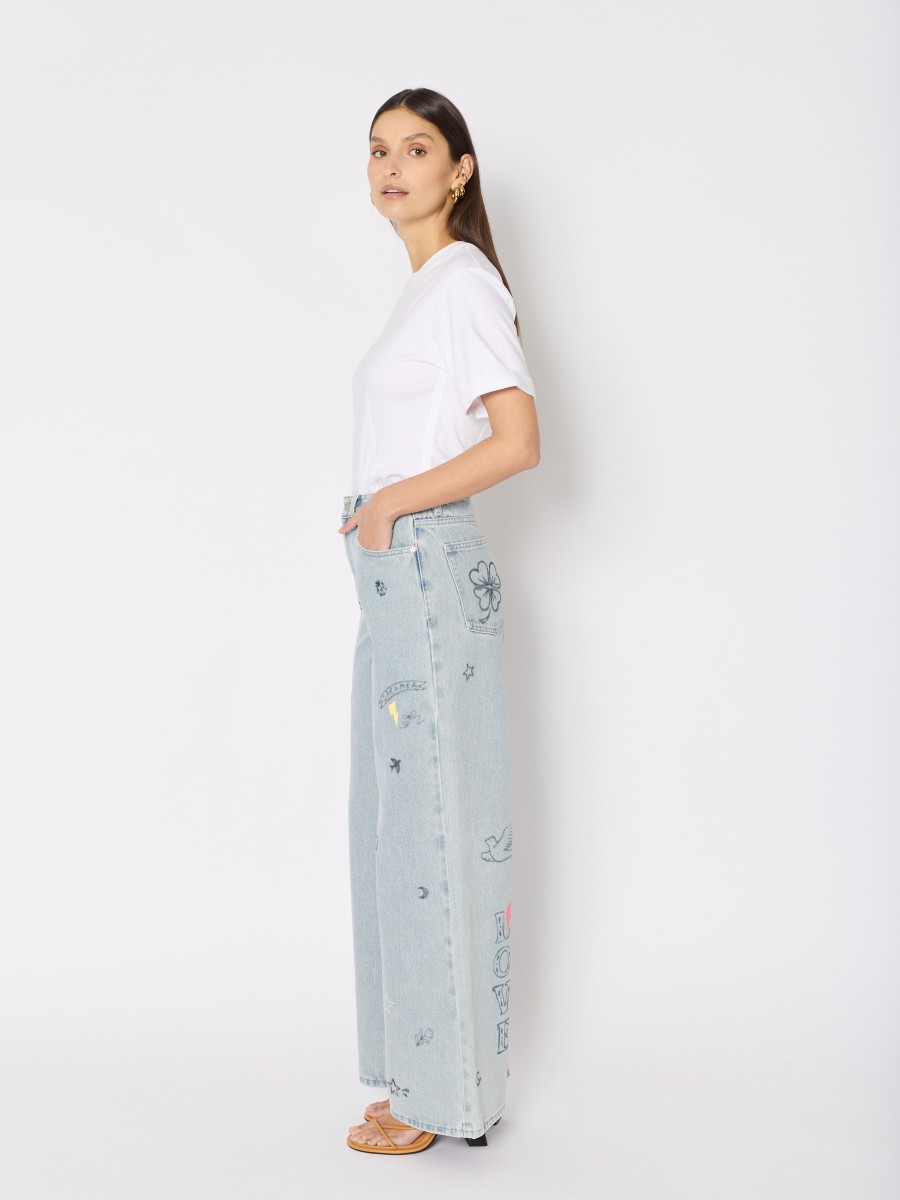 Berenice Jean Bleu MEMPHISLUCKY – Coupe Wide Leg 100% Coton Patchs Imprimés Strass
