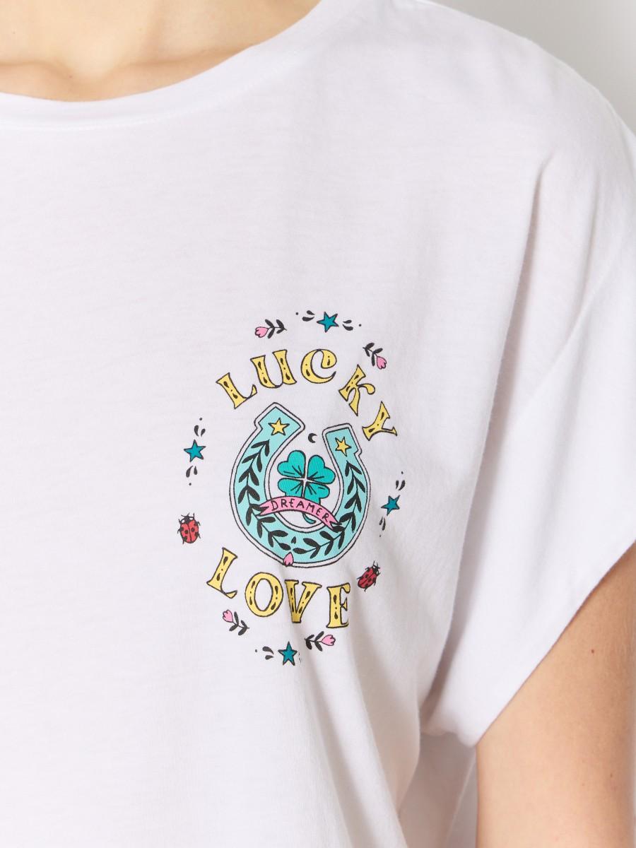 Berenice TELUCK T-shirt Blanc Sans Manches Avec Motif "Lucky Love"
