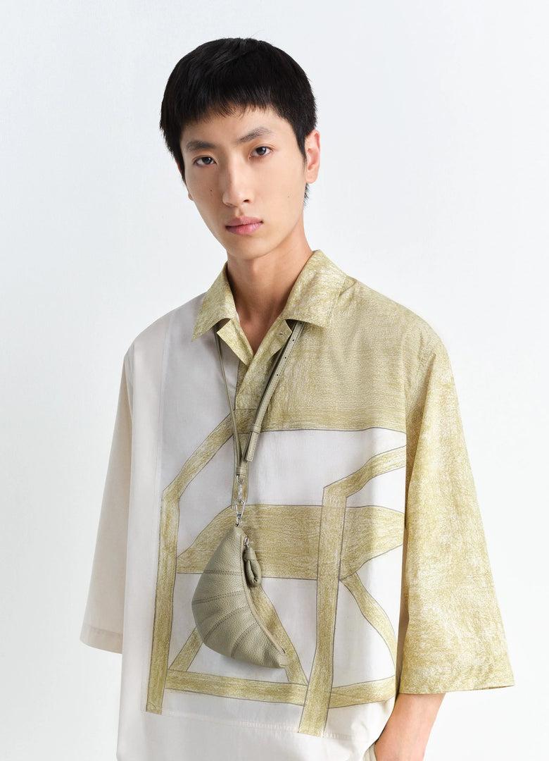 Christophe Lemaire PORTE-MONNAIE CROISSANT BANDOULIÈRE