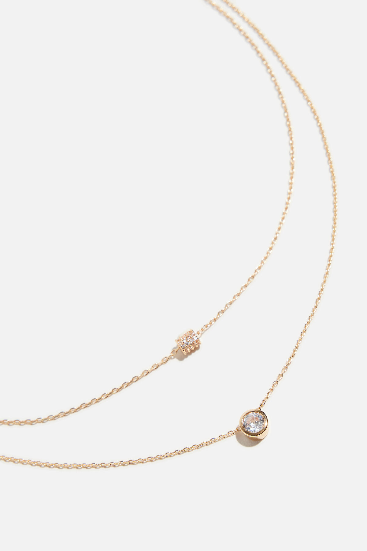 dynamite Ensemble de 2 colliers à pierres et rouleau