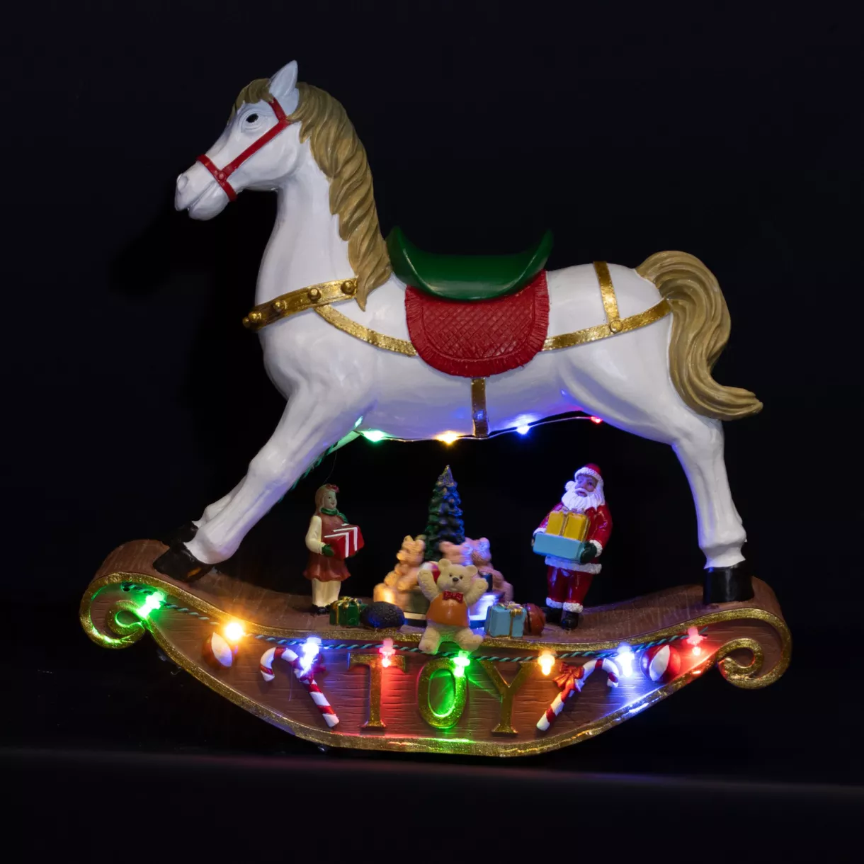 eminza Cheval à bascule lumineux à piles 14 LED (H27 cm) Magie Multicolore