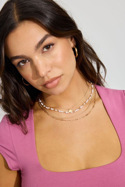 garage Ensemble de 4 colliers à perles et petit médaillon