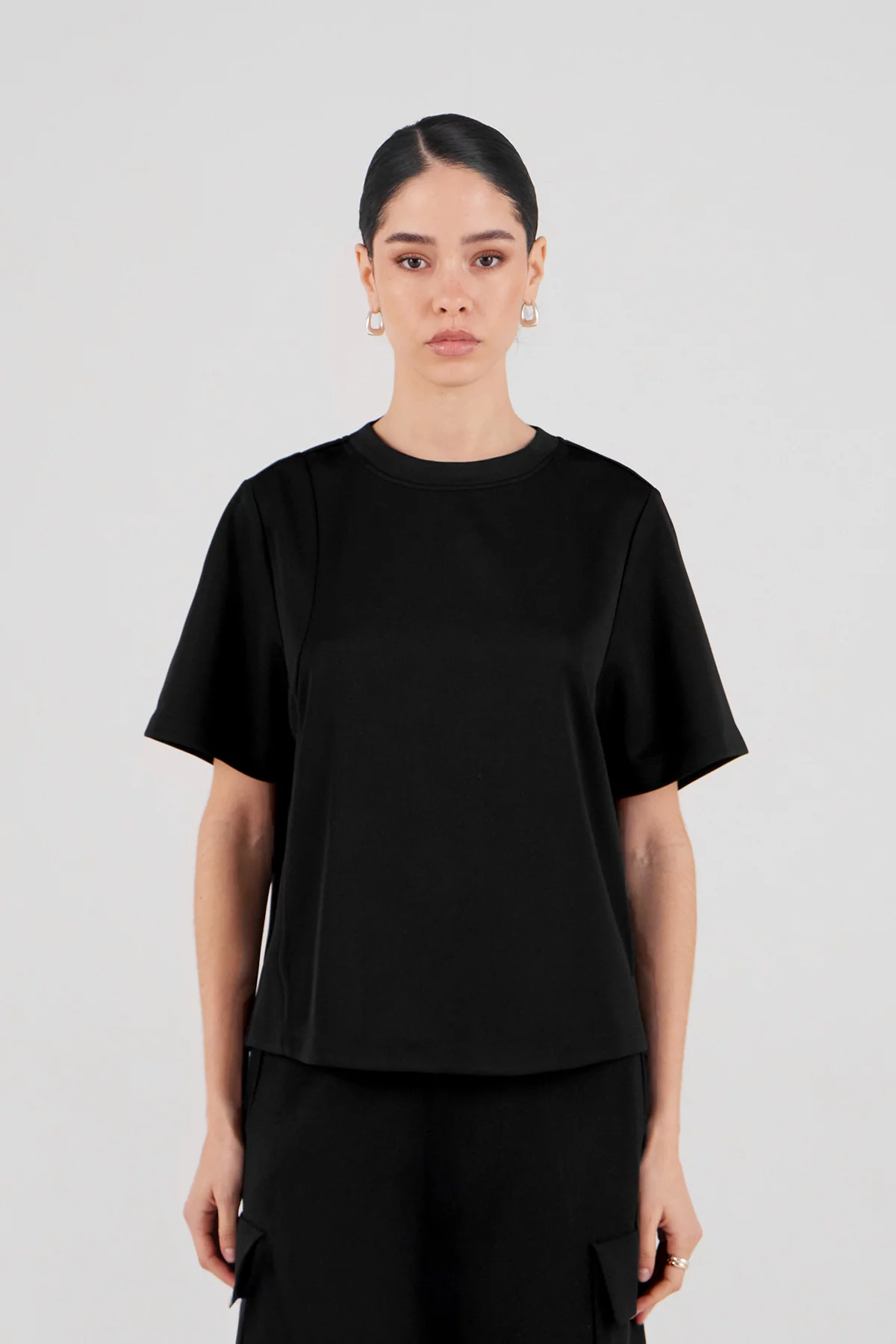 gertrude gaston Top en maille asymétrique avec dos ouvert Walden