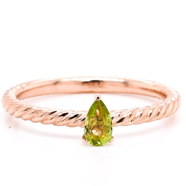 graziella 10KT Rose Gold Pear Shape Peridot Ring. Peridot: 5x3mm Band Width: