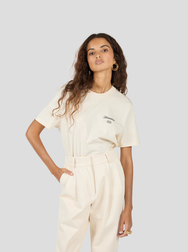 Heimstone T-shirt Collector Unisexe – Crême Avec Logo Heimstone Noir