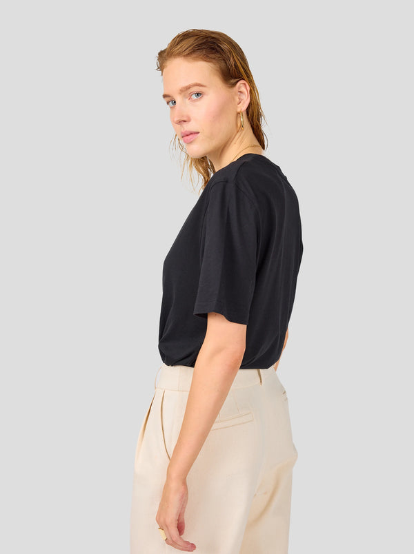 Heimstone T-shirt Collector Unisexe – Noir Avec Logo Heimstone Blanc Cassé