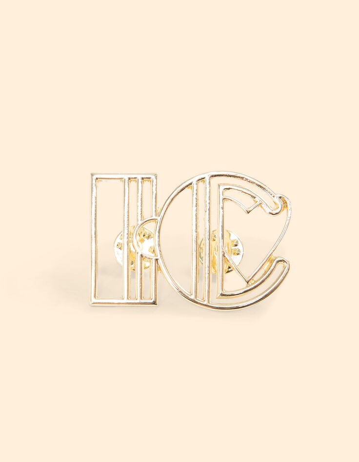 ikks Broche monogramme métal doré I.Code