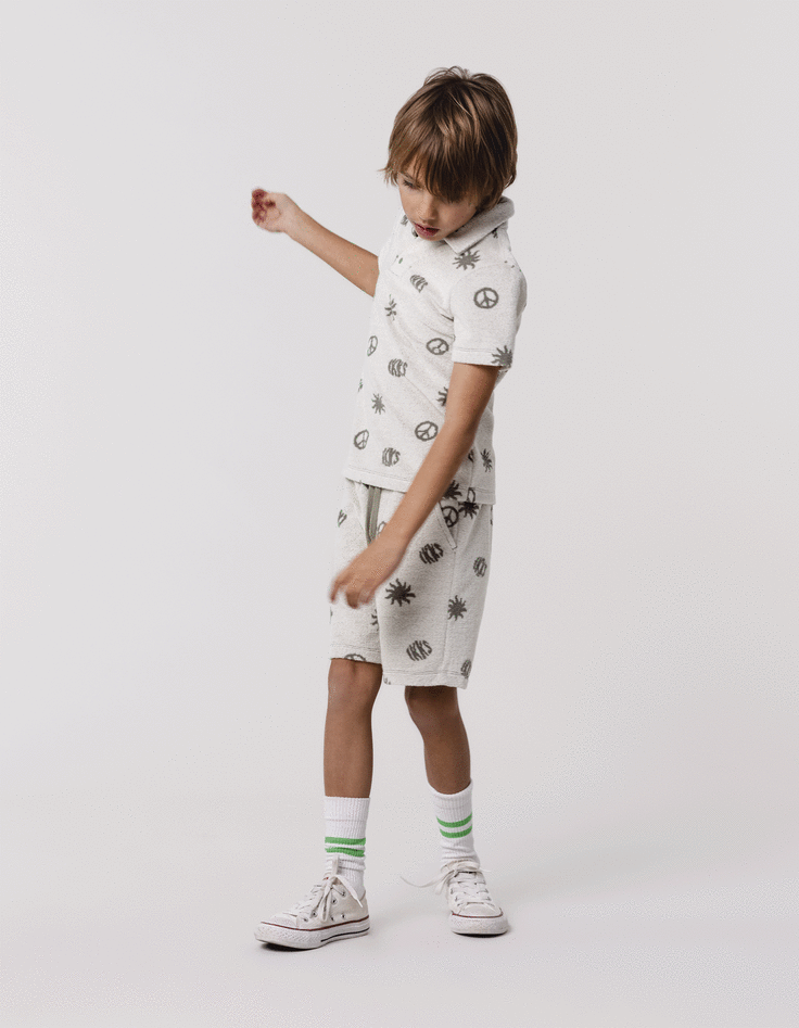 ikks Polo kaki éponge motifs peace and love garçon