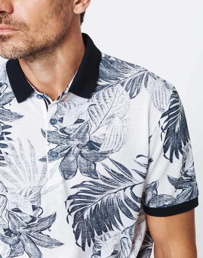 izac Polo blanc fleurs tropicales