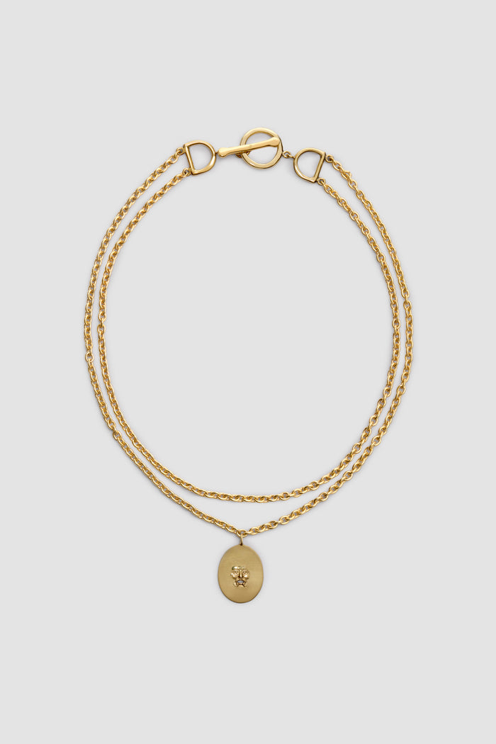 jean patou Collier à pendentif Bocca en laiton Gold