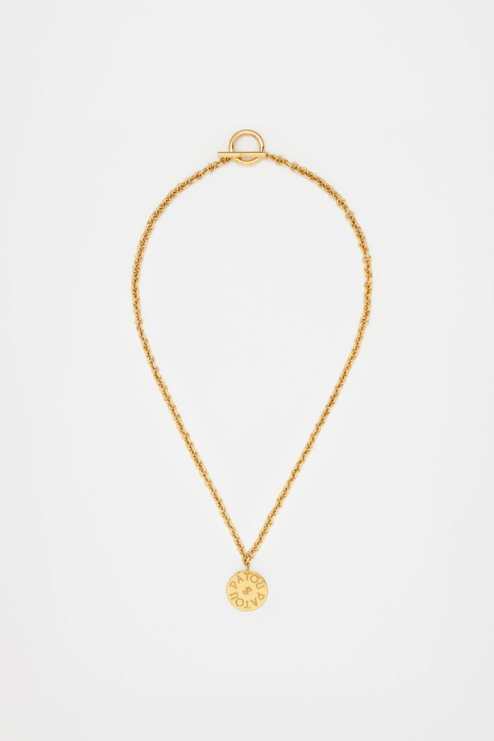jean patou Collier à pendentif pièce en laiton doré Gold