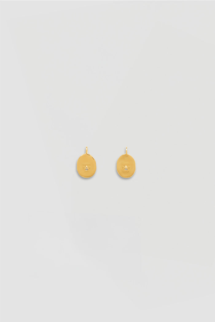 jean patou Petites boucles d’oreilles visage en laiton Gold