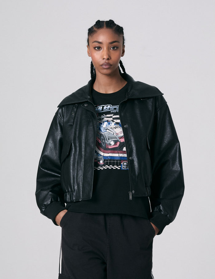 jennyfer Veste noire en matière enduite interieur en faussse fourrure