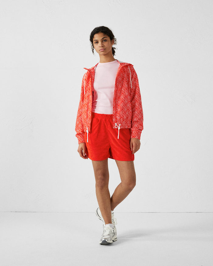 Just Over The Top Blouson Coupe-vent Léger à Capuche Mono Rouge Feu Alize Monogram