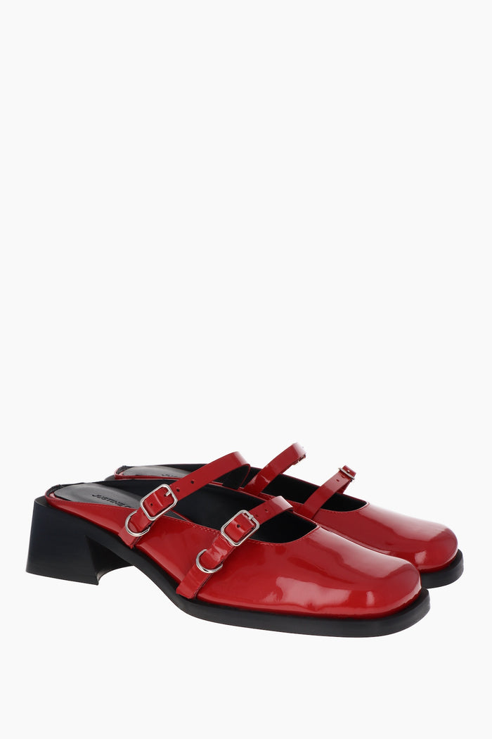 Justine Clenquet Mules Andie Rouge Verni