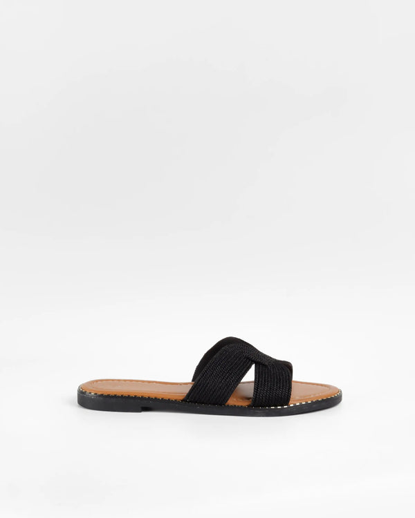 la bottine souriante Mules plates tressées Ella