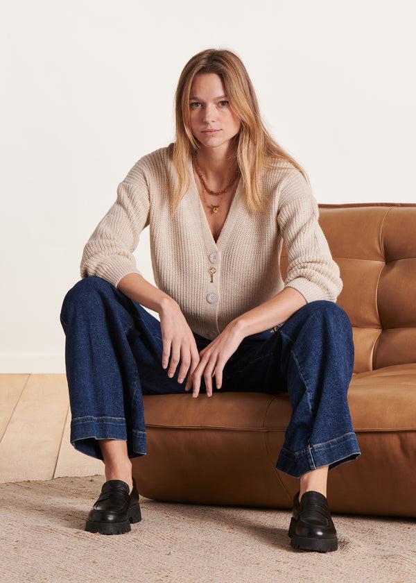 la fée maraboutée Gilet écru court en maille côtes perlées