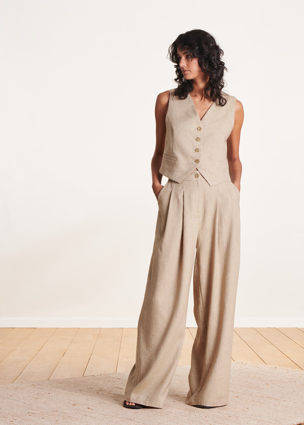 la fée maraboutée Pantalon ample beige à taille haute
