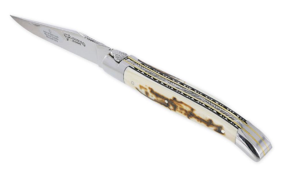 laguiole Couteau Laguiole en Aubrac 1 pièce 12cm Manche Croute d’Ivoire de Mammouth 2 Mitres Double Platines Inox Brillant et Laiton Guillochées Entretoise Noire Ressort Guilloché Finition Brillante