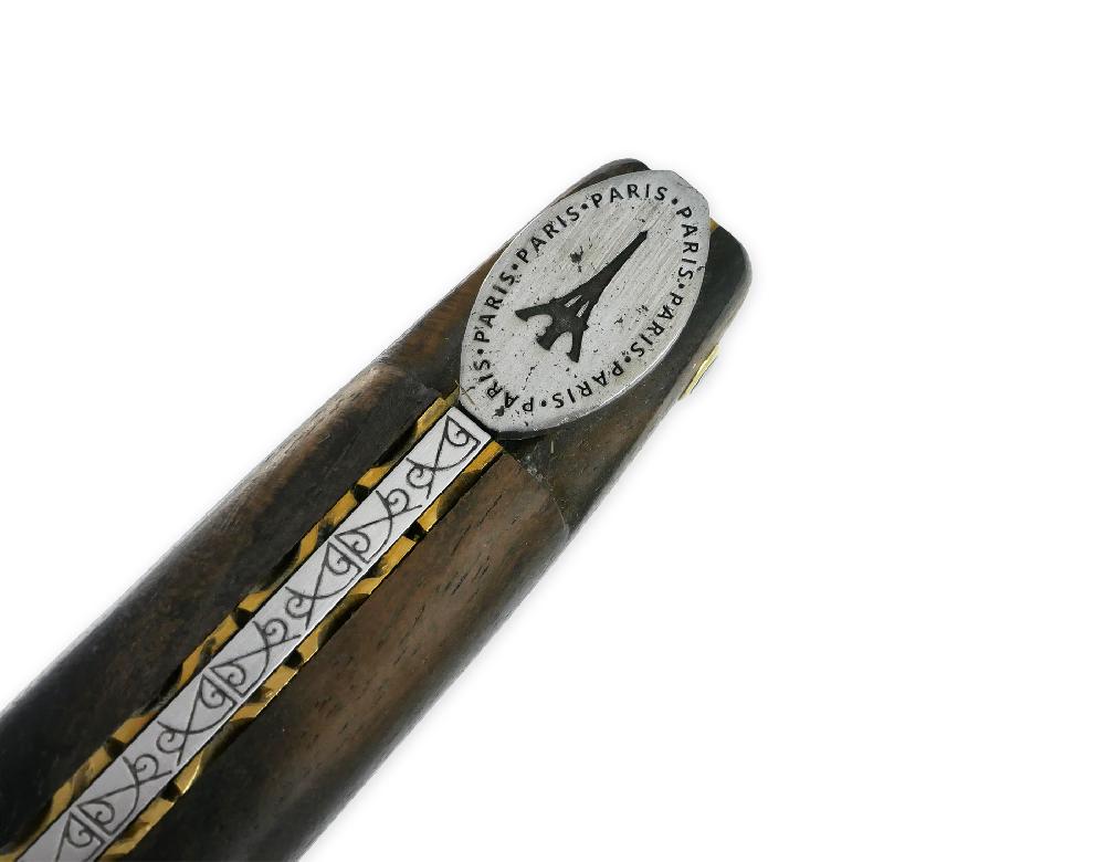 Laguiole Couteau Laguiole En Aubrac 1 Pièce 12cm Tour Eiffel Plein Manche Ebène Platines Laiton Guillochées Ressort Gravé Mouche Plate En Forme De Médaillon Avec La Tour Eiffel Au Centre Finition Brossée Edition Limitée E