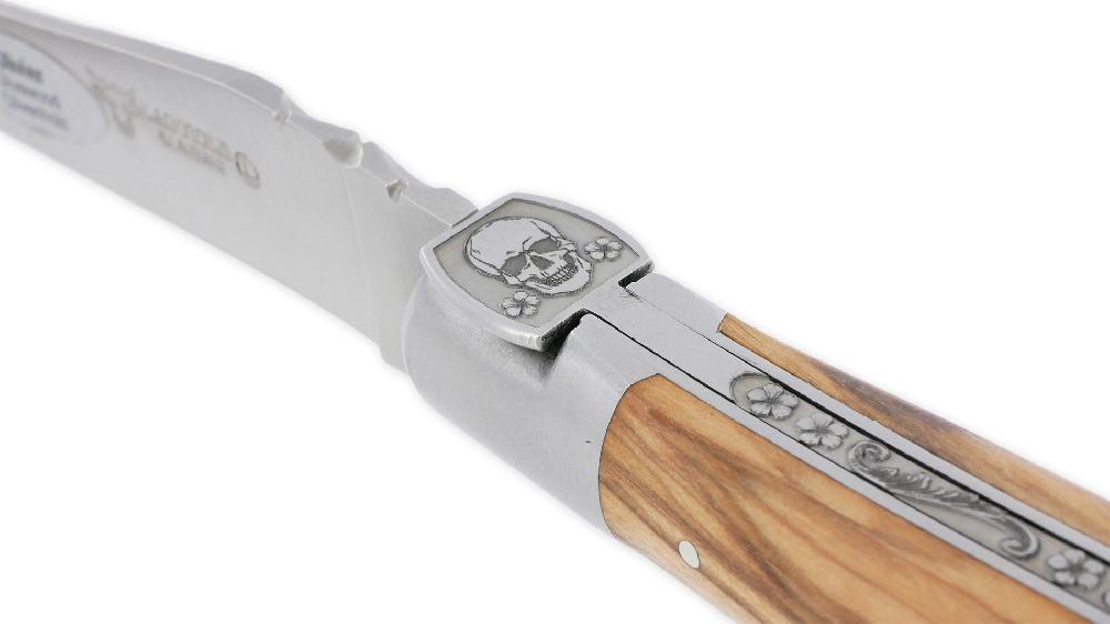 Laguiole Laguiole En Aubrac Knife 1 Piece 12 Cm Olivewood Handle Engraved Spring Forged Fly Prestige Skull 2 ​​Brushed Stainless Steel Bolsters