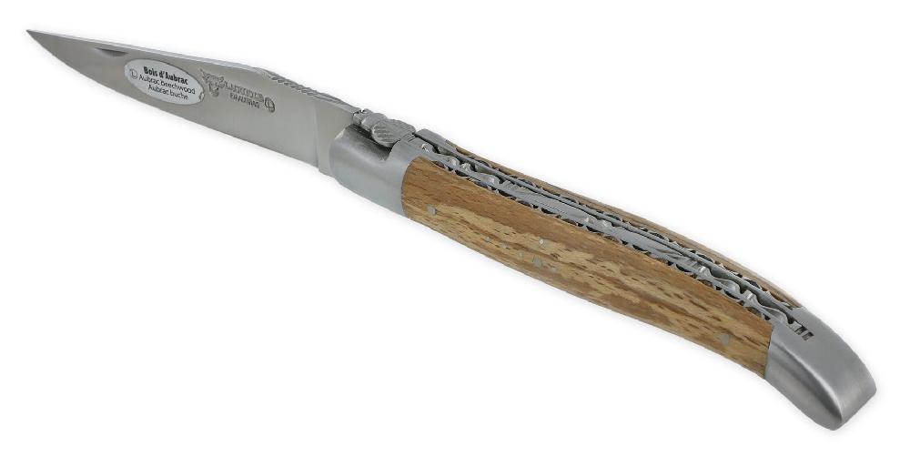 laguiole Laguiole en Aubrac knife 1 piece 12cm Aubrac wood handle 2 brushed stainless steel bolsters Double Handcarved plates and spring Brushed finish NUM6