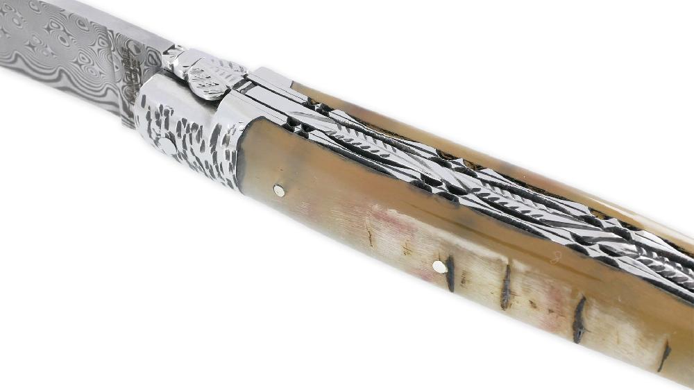 Laguiole Laguiole En Aubrac Knife 1 Piece 12cm Double Plates And Spring Hand-carved Ram’s Crust Handle 2 Hammered Bolsters Shiny Stainless Steel Damascus Blade
