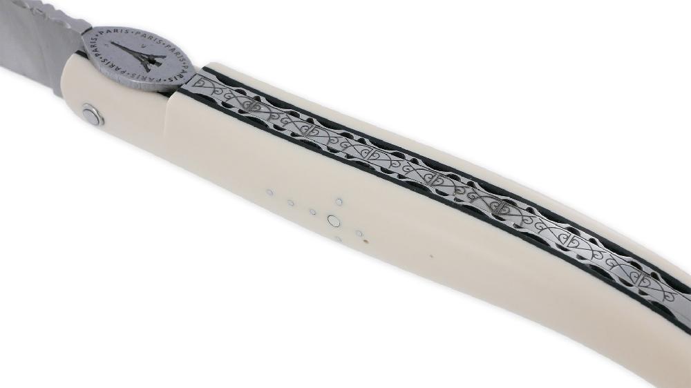 Laguiole Laguiole En Aubrac Knife 1 Piece 12cm Eiffel Tower Full Elforyn Handle Guilloché Plates In Brushed Stainless Steel Black Spacers Engraved Spring Flat Fly In The Shape Of A Medallion With The Eiffel Tower In The Center