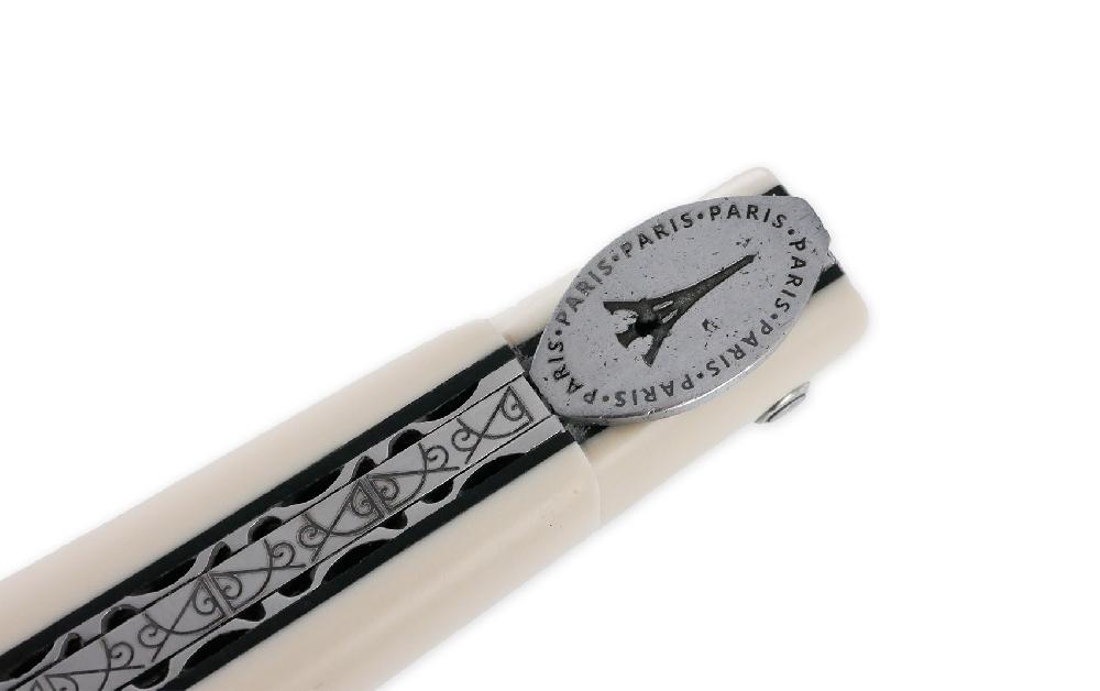 laguiole Laguiole en Aubrac knife 1 piece 12cm Eiffel Tower Full Elforyn handle Guilloché plates in Brushed stainless steel Black spacers Engraved spring Flat fly in the shape of a medallion with the Eiffel Tower in the center