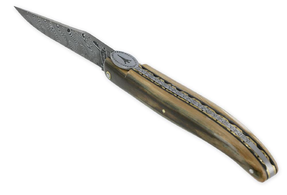 Laguiole Laguiole En Aubrac Knife 1 Piece 12cm Eiffel Tower Full Mammoth Ivory Crust Handle Brass Guilloche Plates Black Spacers Engraved Spring Flat Fly In The Shape Of A Medallion With The Eiffel Tower In The Center Brushed Fi