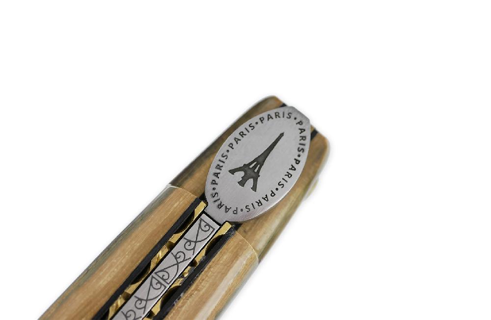 laguiole Laguiole en Aubrac knife 1 piece 12cm Eiffel Tower Full Mammoth Ivory Crust handle Brass guilloche plates Black spacers Engraved spring Flat fly in the shape of a medallion with the Eiffel Tower in the center Brushed fi
