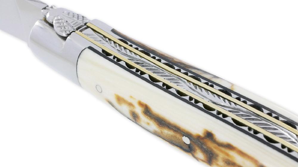 Laguiole Laguiole En Aubrac Knife 1 Piece 12cm Mammoth Ivory Crust Handle 2 Double Bolsters Bright Stainless Steel And Brass Carved Plates Black Spacer Handcarved Spring Shiny Finish