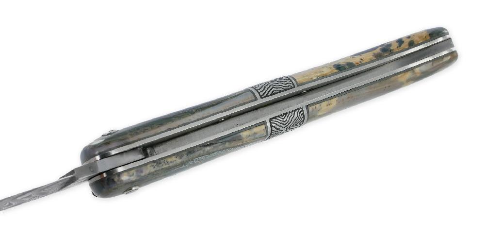 Laguiole Laguiole En Aubrac Prestige Knife 1 Piece 12 Cm Guilloché Spring Blue Mammoth Ivory Handle Engraved Central Bolster Reverse Prestige Fly Damascus Blade UNIQUE PIECE