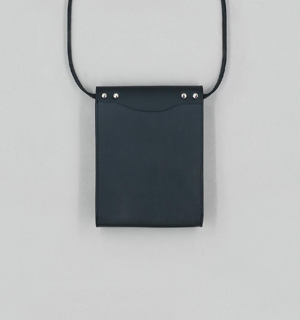Laperruque Pochette à RabatVeau à Double Tannage Noir