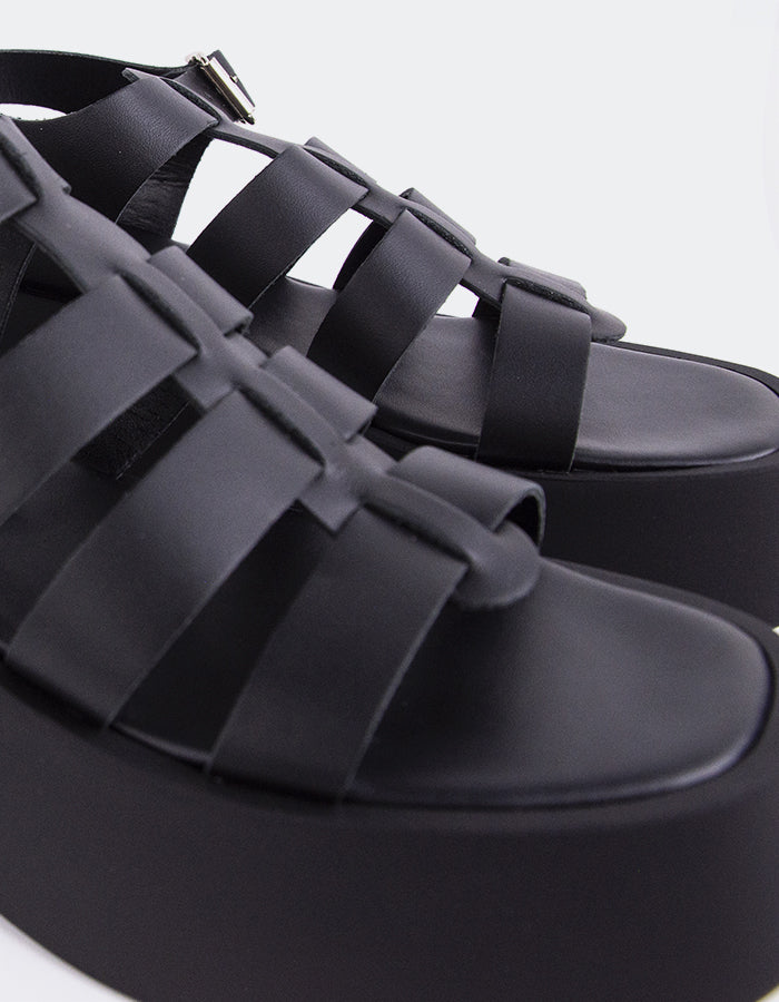 L'intervalle Confident Noir Cuir Noir