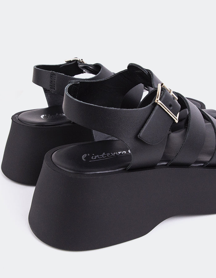 L'intervalle Confident Noir Cuir Noir