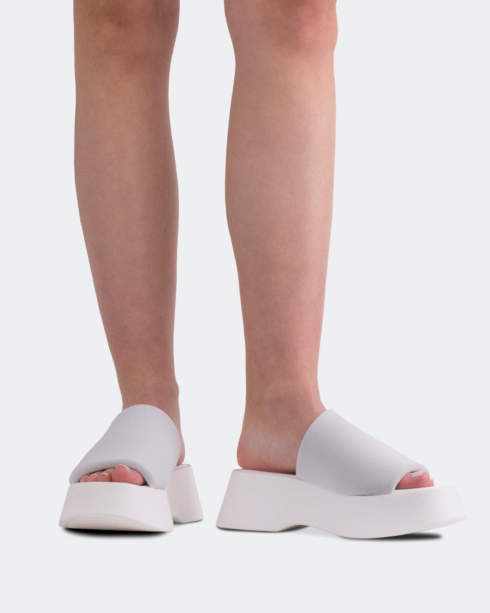 L'intervalle Liu Blanc Lycra Blanc