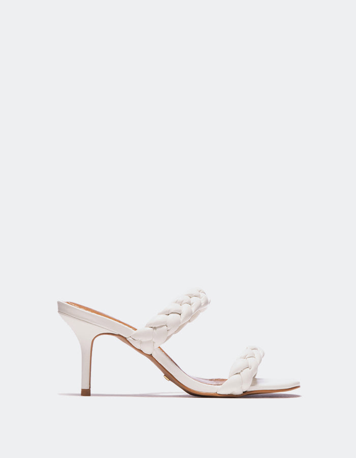 l'intervalle Nigella cuir blanc Blanc