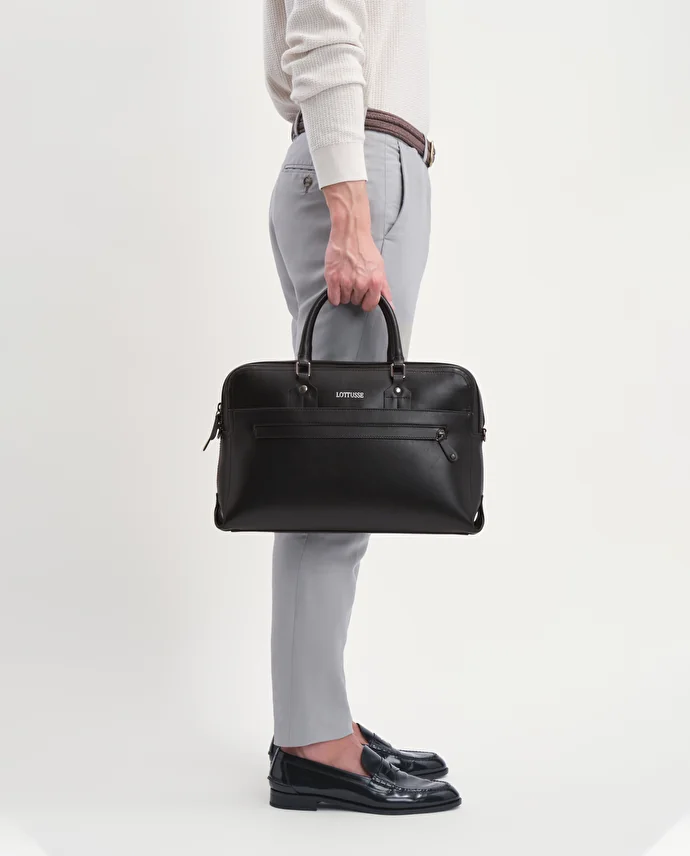 lottusse Sac Borne en cuir de vache Noir