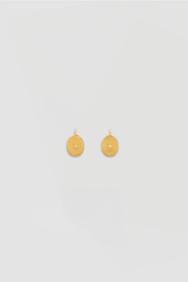 patou Petites boucles d’oreilles visage en laiton