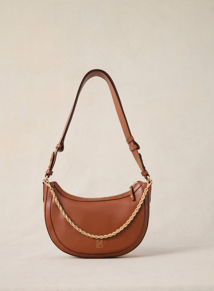 petite mendigote Saula - Sac demi-lune en cuir camel