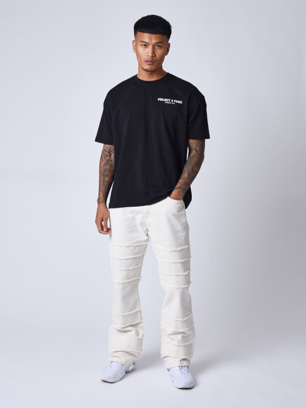 project x paris Jeans évasé à détails effilochés