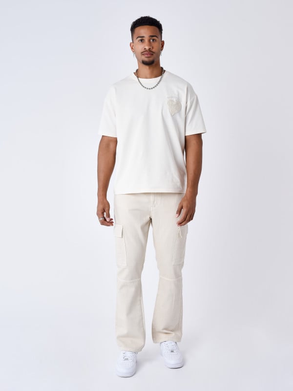 project x paris Jeans flare a découpes