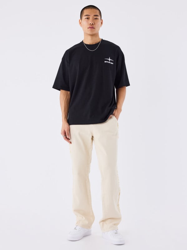 project x paris Pantalon évasé a détails frange