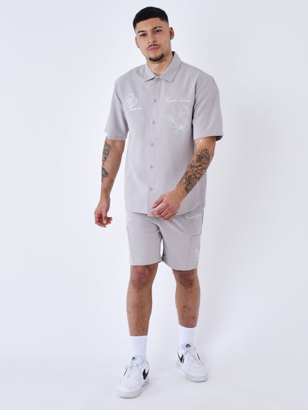 project x paris Short brodé à fleurs