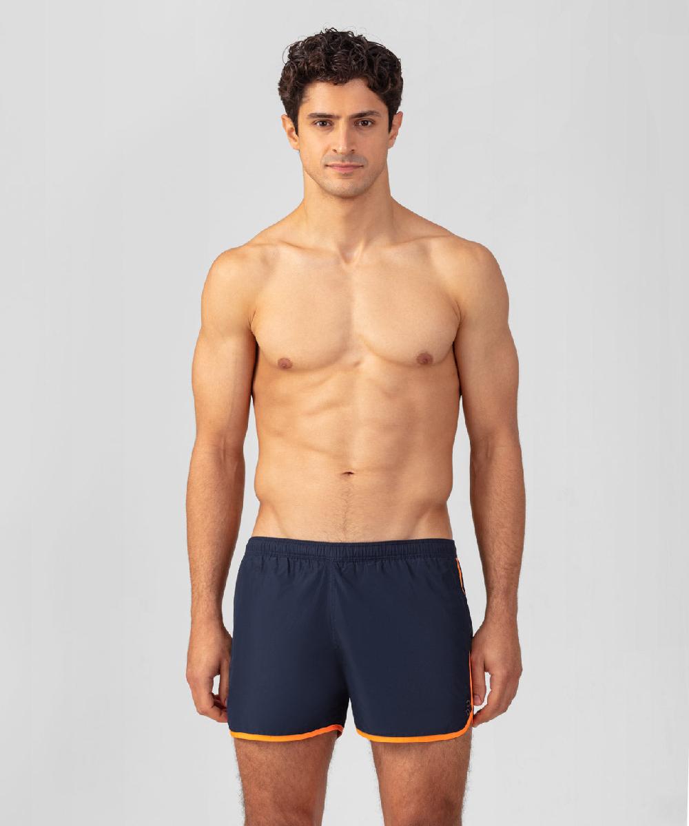 ron dorff Short de bain avec bords arrondis et bandes contrastées Bleu marine/orange fluo