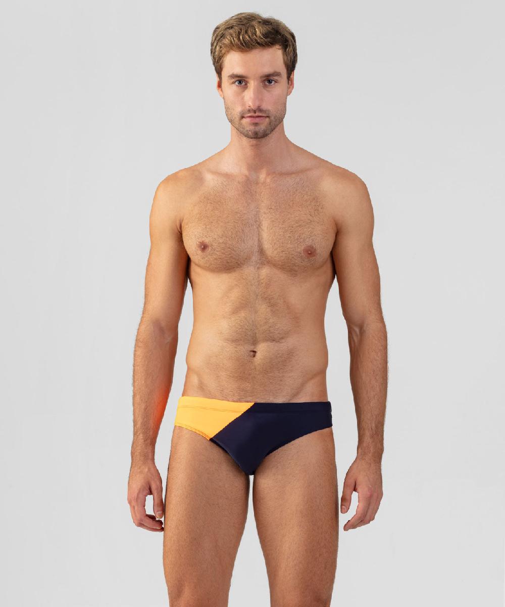 ron dorff Slip de bain échancré bicolore Bleu marine/orange fluo