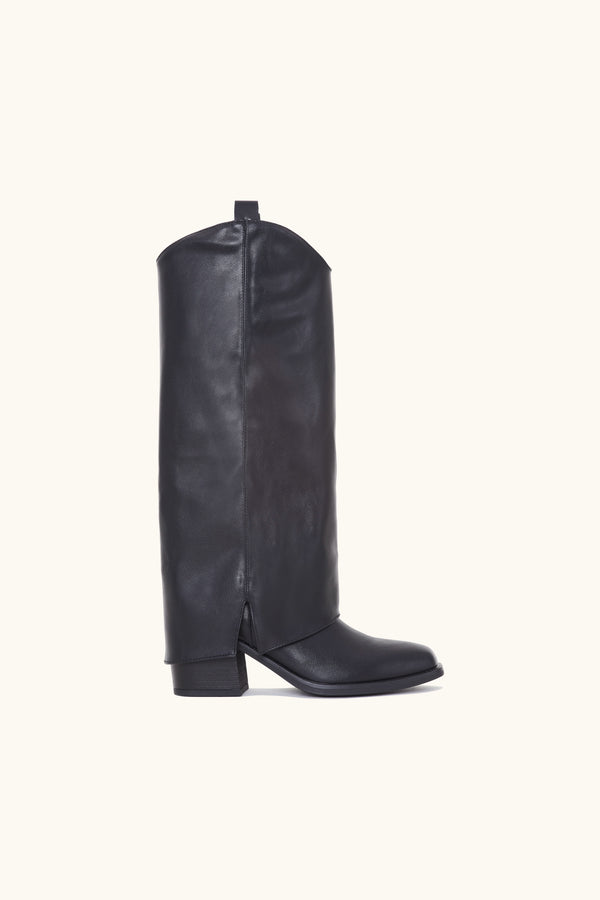 stephan Bottes cowboy à guêtre noires